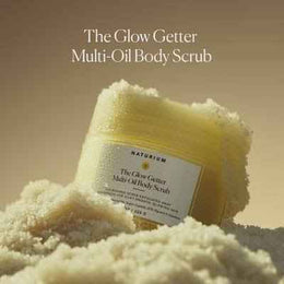 Naturium glow multi oil body scrub